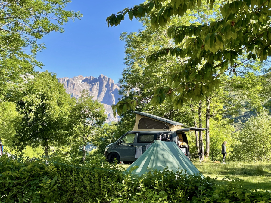 Camping in Picos de Europa. Tent and van with the pics